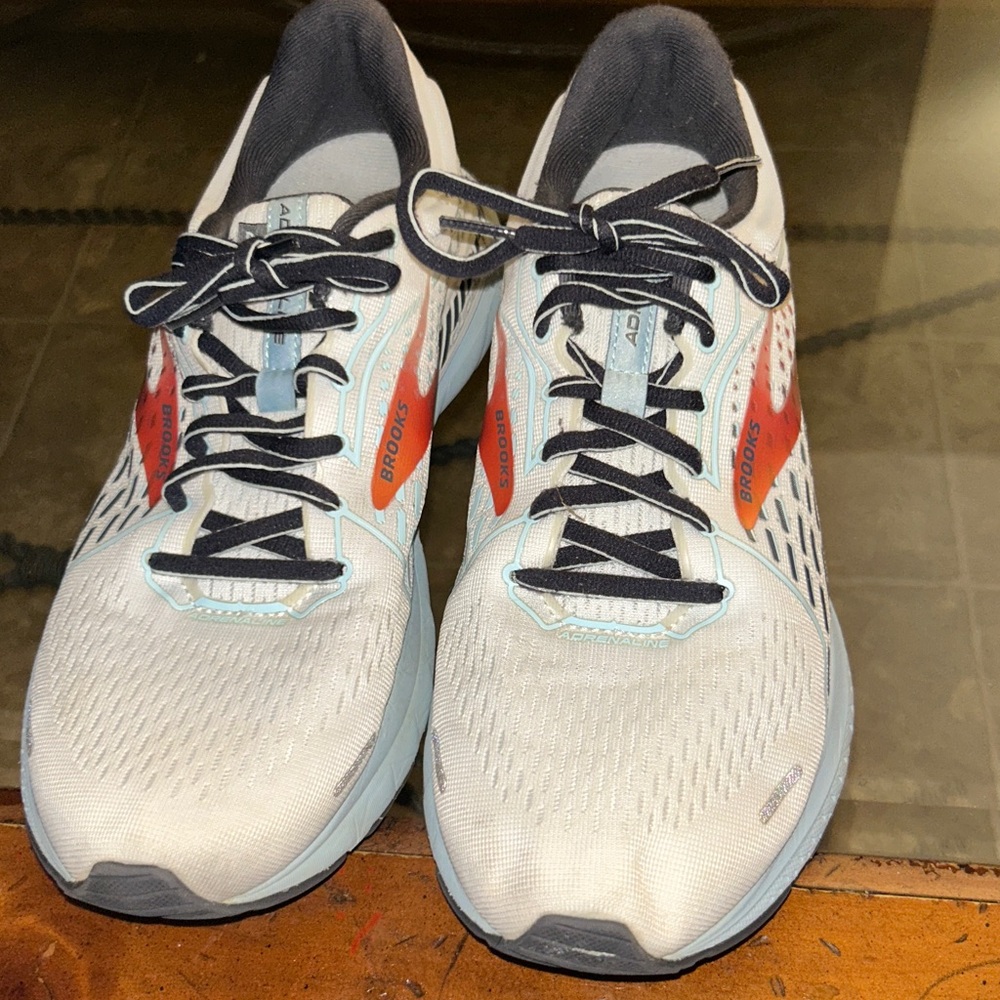 Brooks White and Orange adrenaline 21 running shoe. Great condition size 11 M,